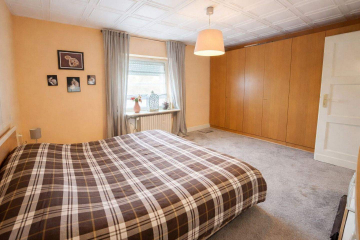 Hauptschlafzimmer 2 - Kompakt. Charmant. Einzigartig. – Ihr modernes blaues Reihenhaus mit Garten & Garage